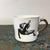 Kuhn Keramik Falling Man 'Glam' Medium Coffee Cup