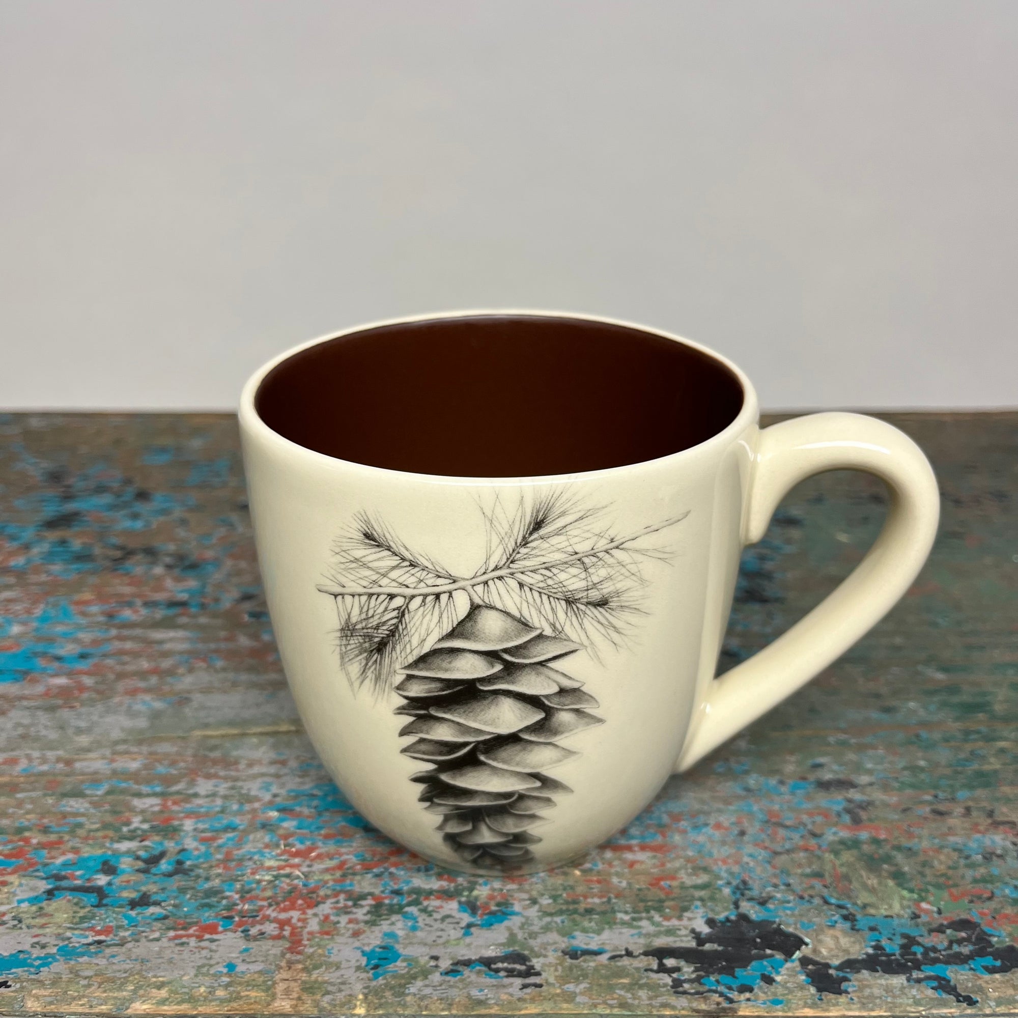 Laura Zindel White Pine Cone Mug