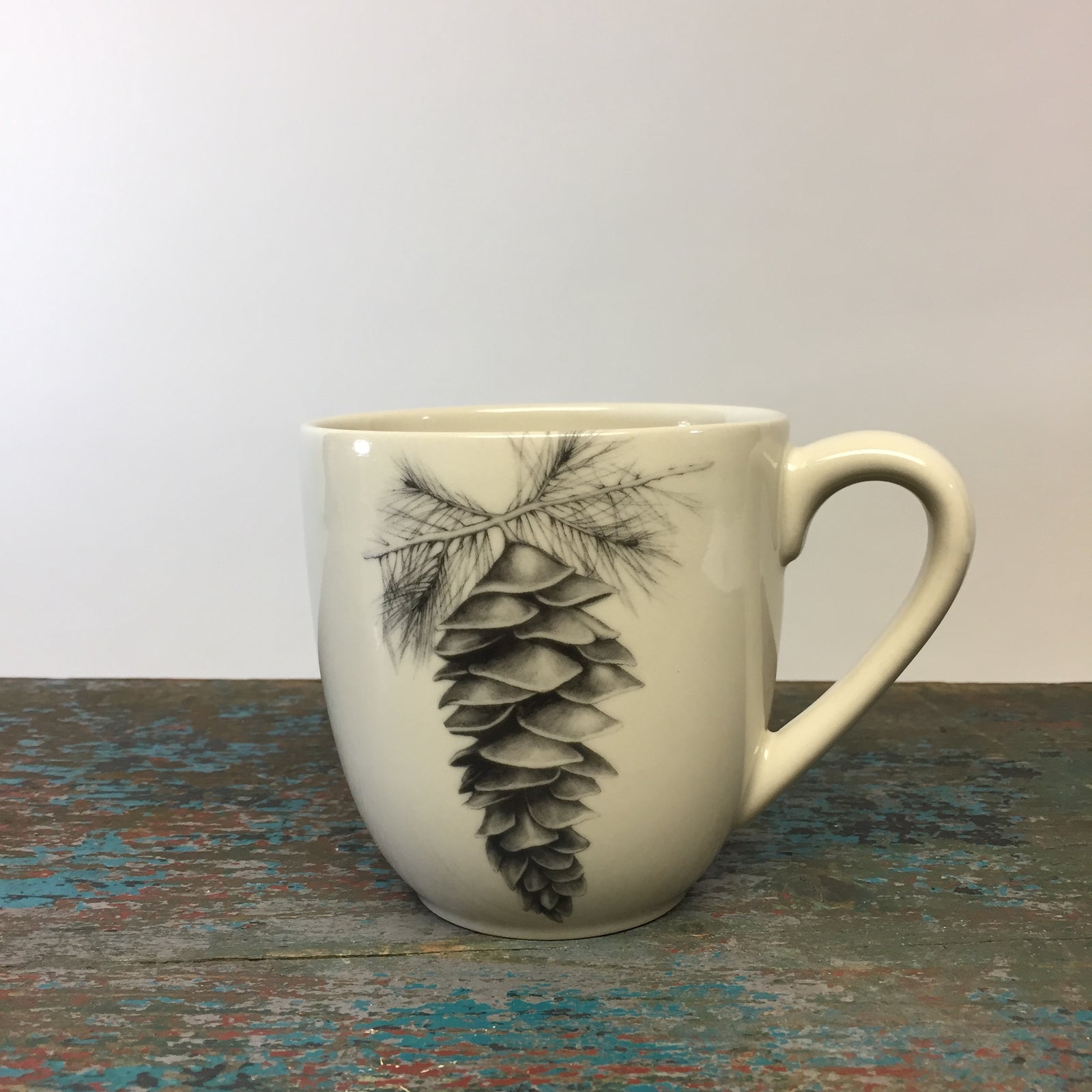 Laura Zindel White Pine Cone Mug