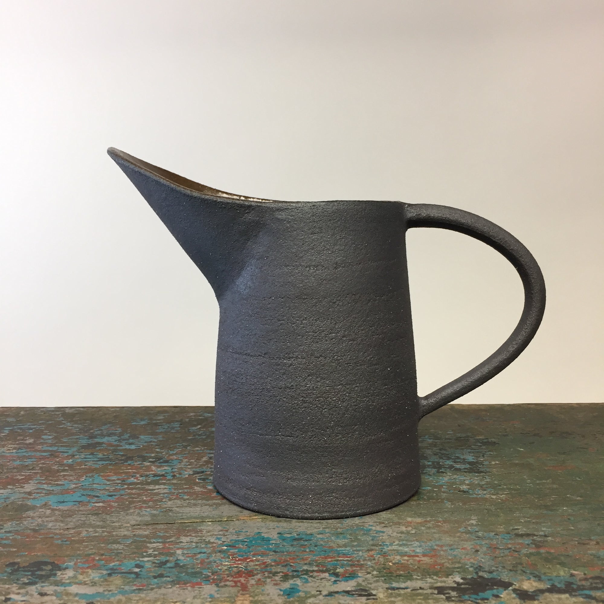 Ceramic Curved Pitcher with Curved Spout Matte Brown Glaze