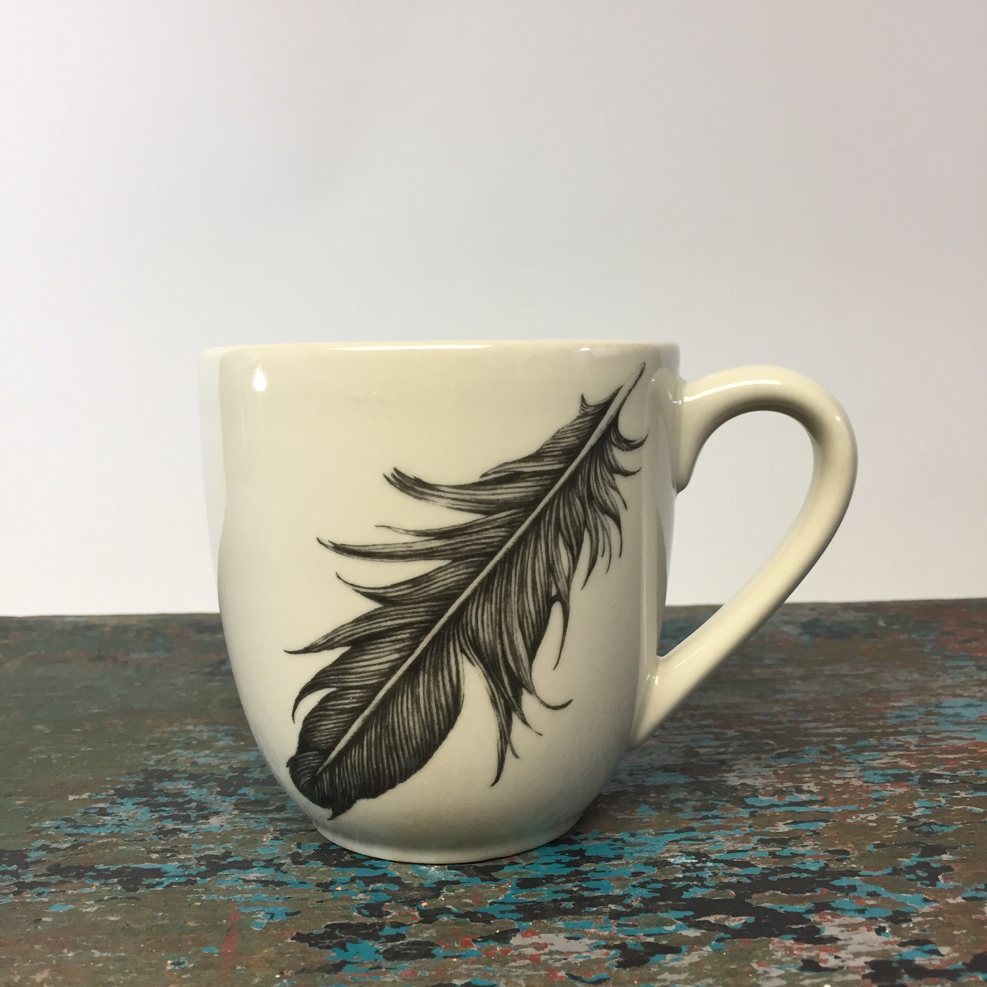 Laura Zindel Raven Feather Mug