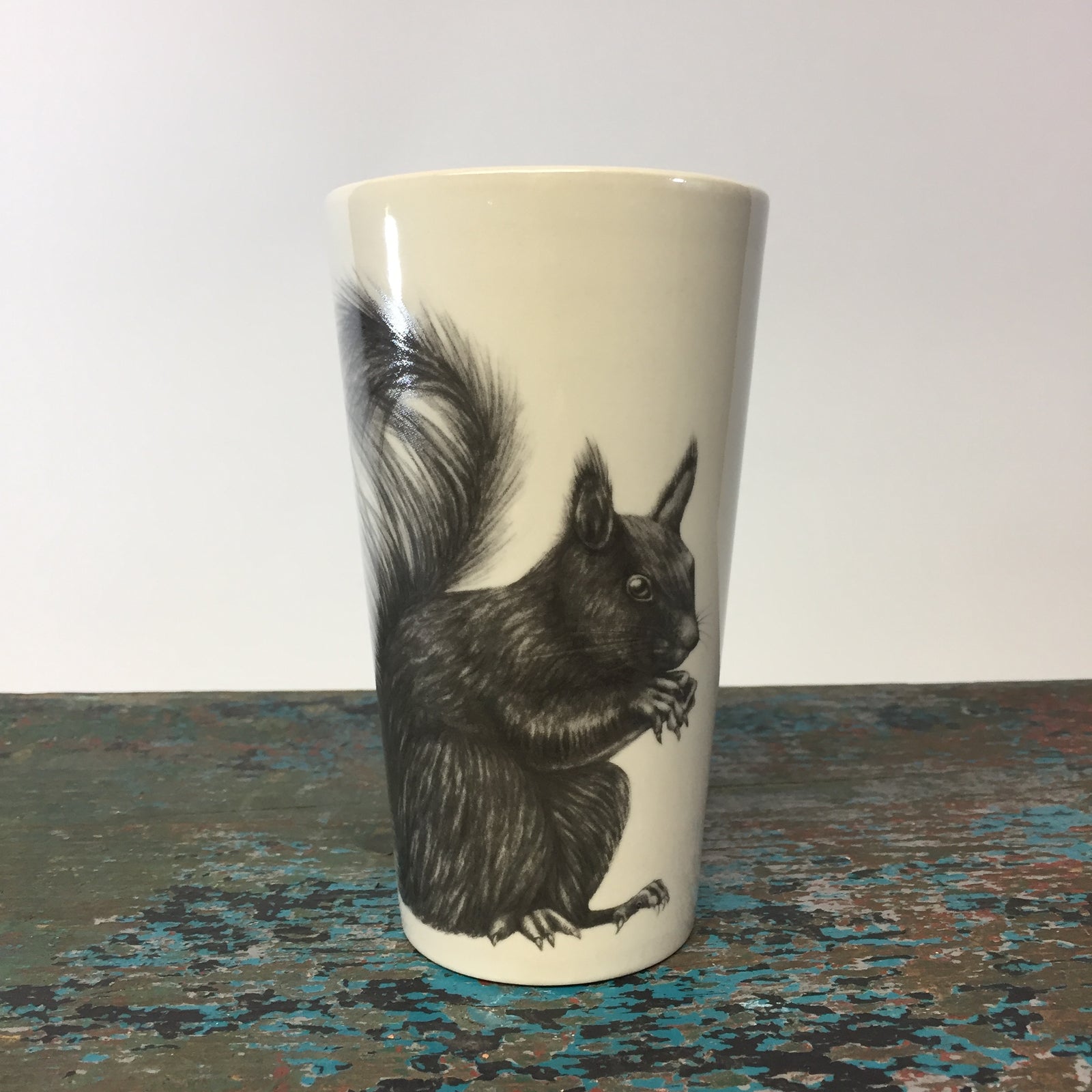 Laura Zindel Squirrel Tumbler.  White Interior.